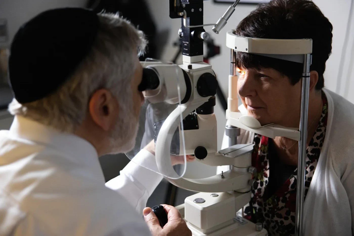Dr. Michael Rom examining a patient at the slit lamp at Insight Eye Center in Mentor, Ohio