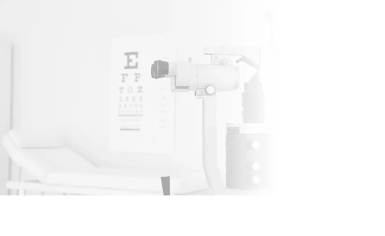 An eye exam lane with an eye chart and a slit lamp at Insight Eye Center in Mentor, Ohio