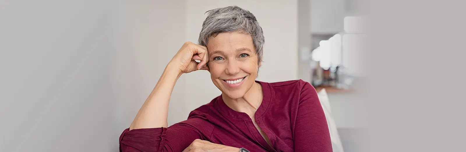 A smiling woman with gray hair — banner photo from the current VERACITY and CALLISTO page